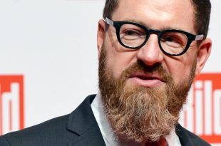 ARCHIV - Der Chefredakteur der «Bild»-Zeitung, Kai Diekmann, kommt am 07.12.2013 in Berlin zur Spendengala «Ein Herz für Kinder». Foto: Jens Kalaene/dpa (zu dpa «Bild» distanziert sich von islamkritischem Kommentar der «BamS» vom 28.07.2014) +++(c) dpa - Bildfunk+++